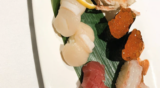 Assorted Sashimi - Fresh selection of premium sashimi including salmon, tuna, and seasonal fish
